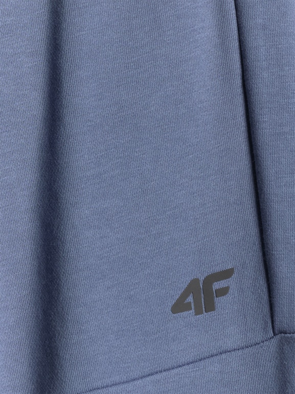 Chłopięce spodnie dresowe joggery 4F 4FJRSS26TTROM1995 - niebieskie