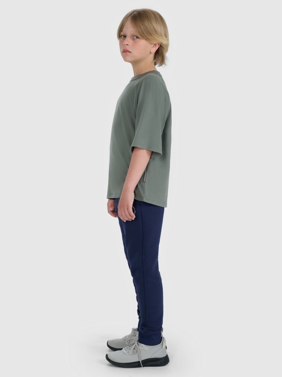 Chłopięce spodnie dresowe joggery 4F 4FJWAW25TTROM1258 - granatowe