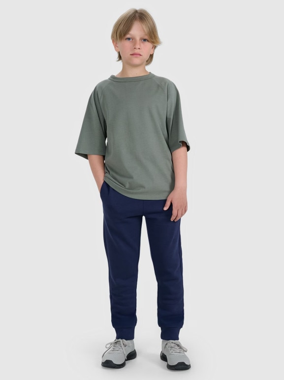 Chłopięce spodnie dresowe joggery 4F 4FJWAW25TTROM1258 - granatowe