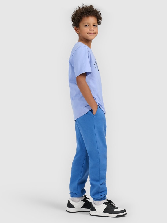 Chłopięce spodnie dresowe joggery 4F 4FJWSS26TTROM1506 - niebieskie