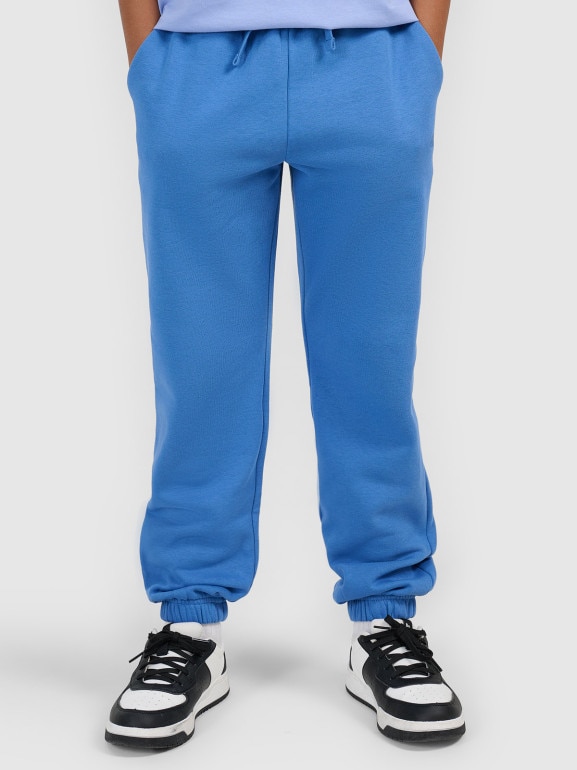Chłopięce spodnie dresowe joggery 4F 4FJWSS26TTROM1506 - niebieskie