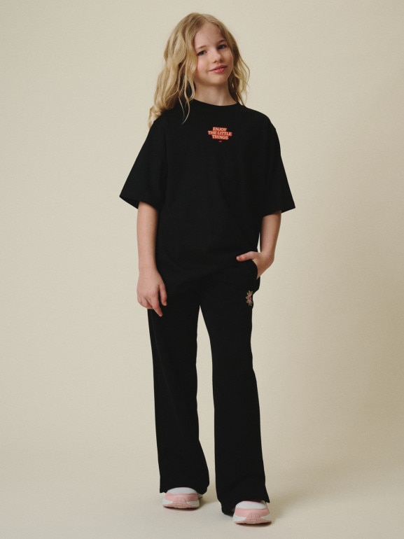 Dziewczęce spodnie dresowe 4F 4FJRSS26TTROF1870 - czarne