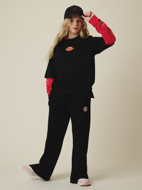 Dziewczęce spodnie dresowe 4F 4FJRSS26TTROF1870 - czarne