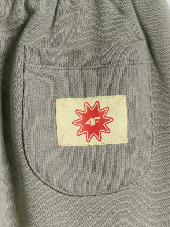 Dziewczęce spodnie dresowe 4F 4FJRSS26TTROF1871 - beżowe