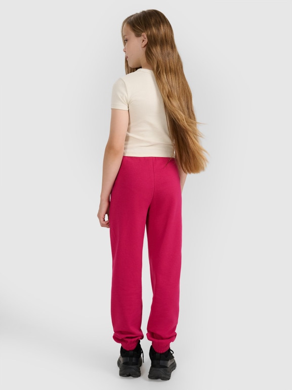 Dziewczęce spodnie dresowe 4F 4FJWAW25TTROF1242 - różowe