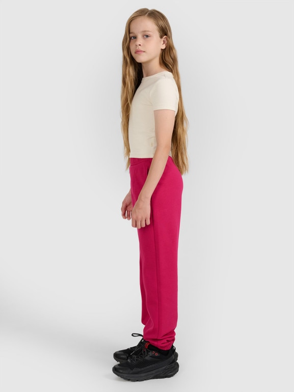 Dziewczęce spodnie dresowe 4F 4FJWAW25TTROF1242 - różowe