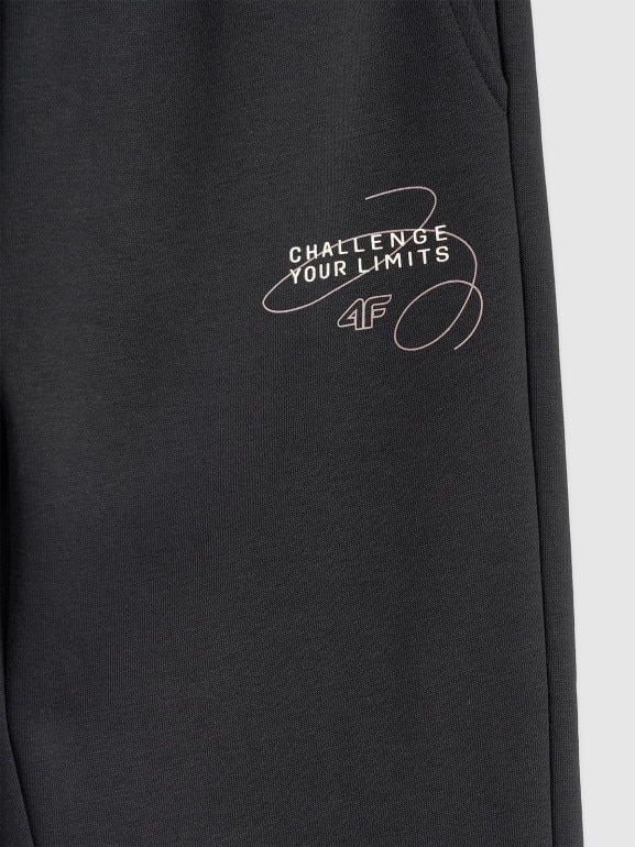 Dziewczęce spodnie dresowe 4F 4FJWAW25TTROF1248 - czarne
