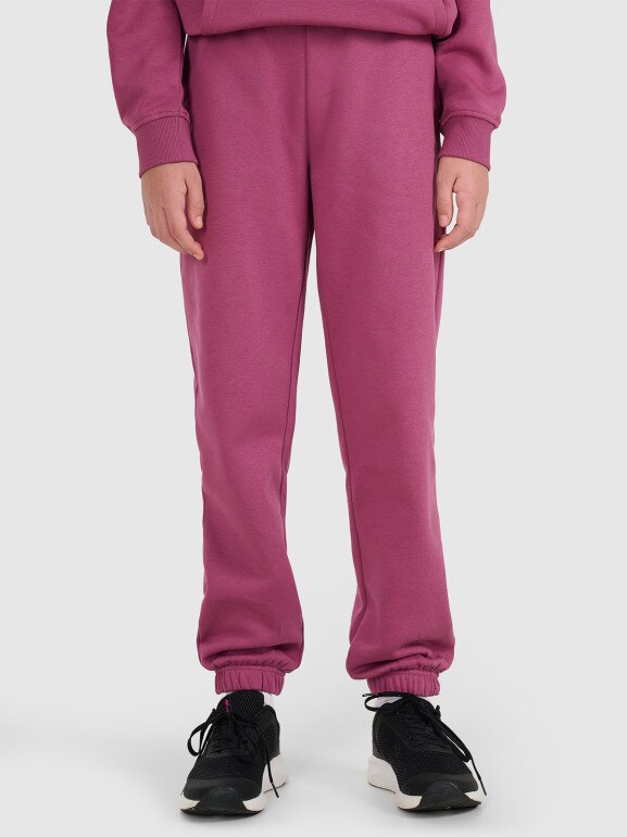 Dziewczęce spodnie dresowe joggery 4F 4FJRAW25TTROF1616 - fioletowe