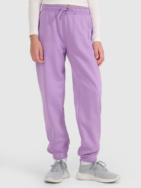 Dziewczęce spodnie dresowe joggery 4F 4FJRAW25TTROF1616 - fioletowe