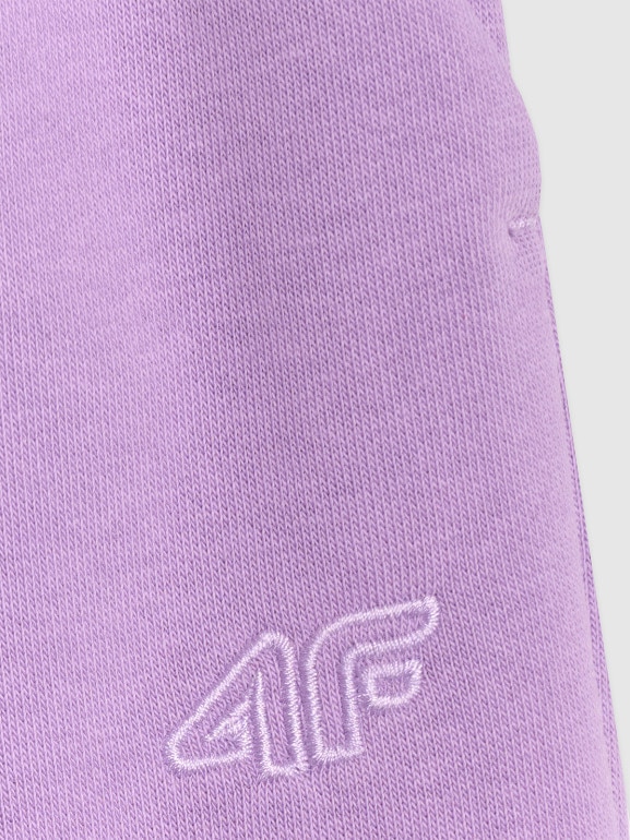Dziewczęce spodnie dresowe joggery 4F 4FJRAW25TTROF1616 - fioletowe