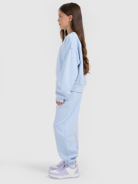 Dziewczęce spodnie dresowe joggery 4F 4FJRAW25TTROF1642 - niebieskie