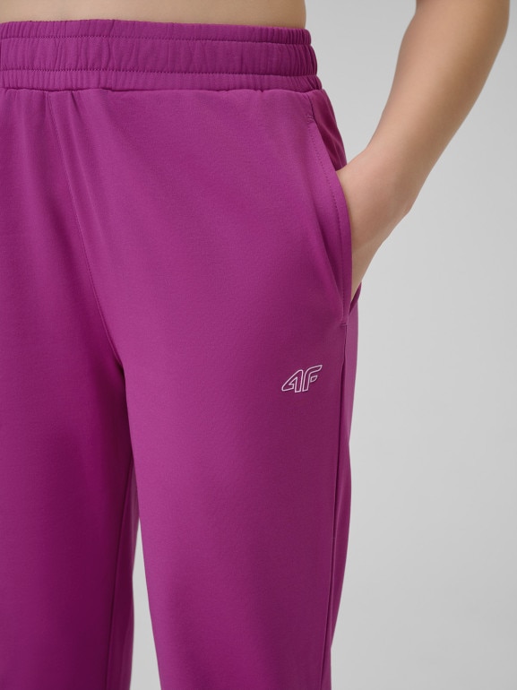 Dziewczęce spodnie dresowe joggery 4F 4FJRSS26TFTRF1458 - różowe