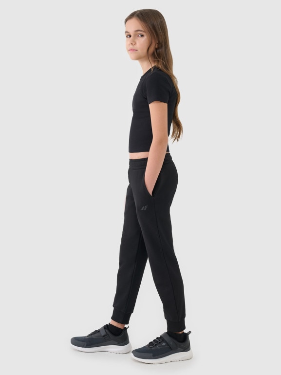 Dziewczęce spodnie dresowe joggery 4F 4FJWSS25TTROF1099 - czarne
