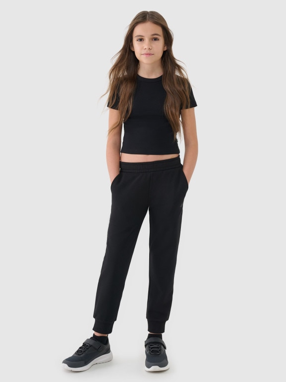 Dziewczęce spodnie dresowe joggery 4F 4FJWSS25TTROF1099 - czarne