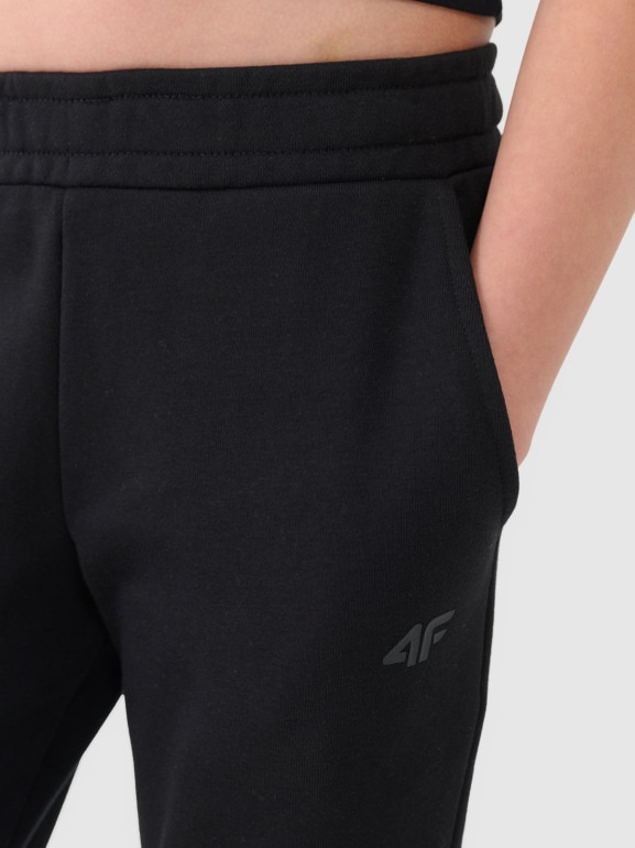 Dziewczęce spodnie dresowe joggery 4F 4FJWSS25TTROF1099 - czarne