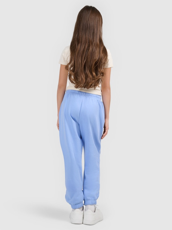Dziewczęce spodnie dresowe joggery 4F 4FJWSS26TTROF1502 - niebieskie