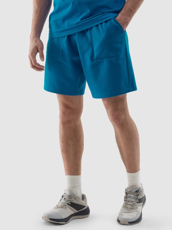 Męskie spodenki dresowe 4F 4FWSS24TSHOM330 - niebieskie