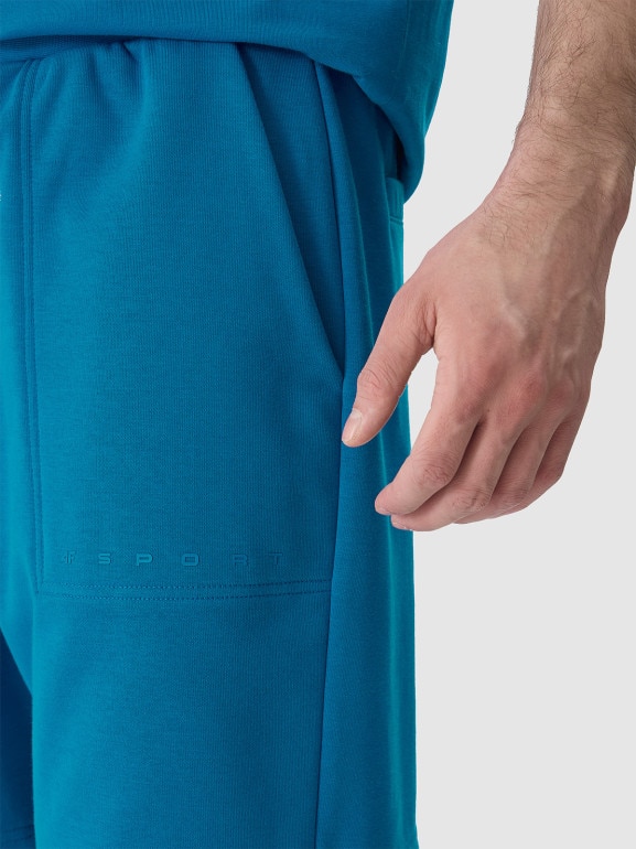 Męskie spodenki dresowe 4F 4FWSS24TSHOM330 - niebieskie