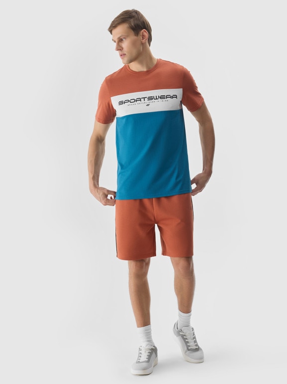 Męskie spodenki dresowe 4F 4FWSS24TSHOM344 - pomarańczowe