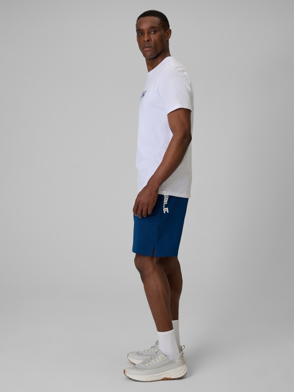 Męskie spodenki dresowe 4F 4FWSS26TSHOM744 - turkusowe