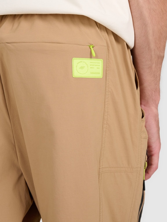 Męskie spodnie casual 4F 4FRAW25TTROM1609 - beżowe