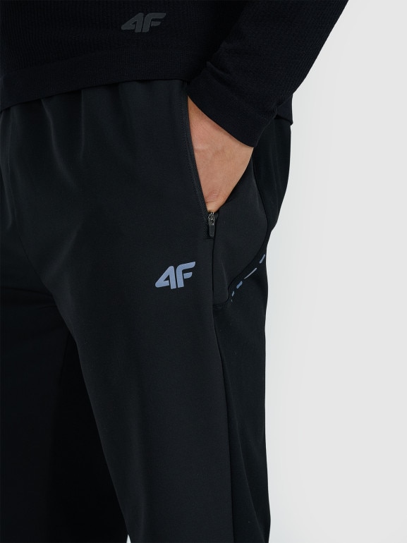 Męskie spodnie do biegania w terenie 4F 4FWAW25TFTRM0930 - czarne