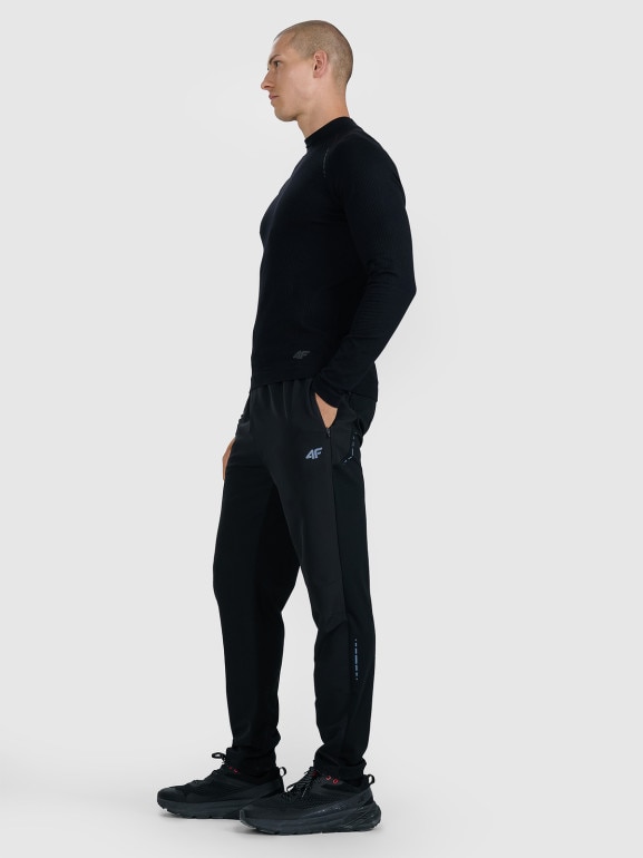 Męskie spodnie do biegania w terenie 4F 4FWAW25TFTRM0930 - czarne