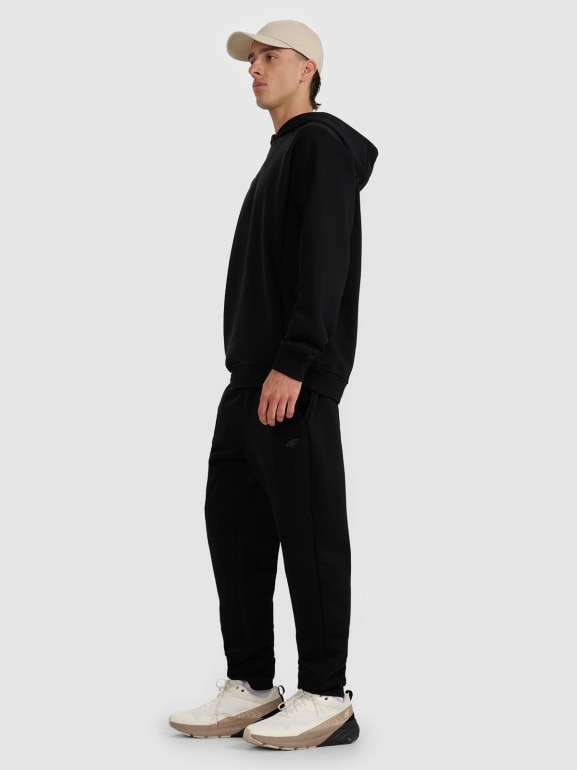 Męskie spodnie dresowe 4F 4FWAW25TTROM1251 - czarne