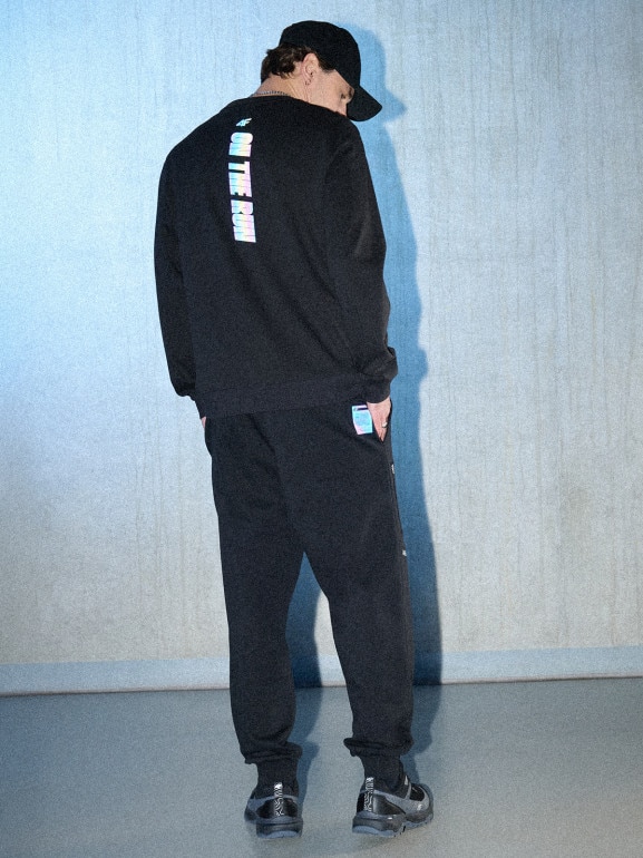 Męskie spodnie dresowe joggery 4F 4FRSS26TTROM1861 - czarne