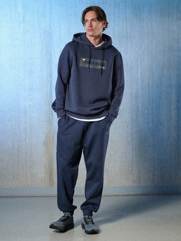 Męskie spodnie dresowe joggery 4F 4FRSS26TTROM1861 - granatowe