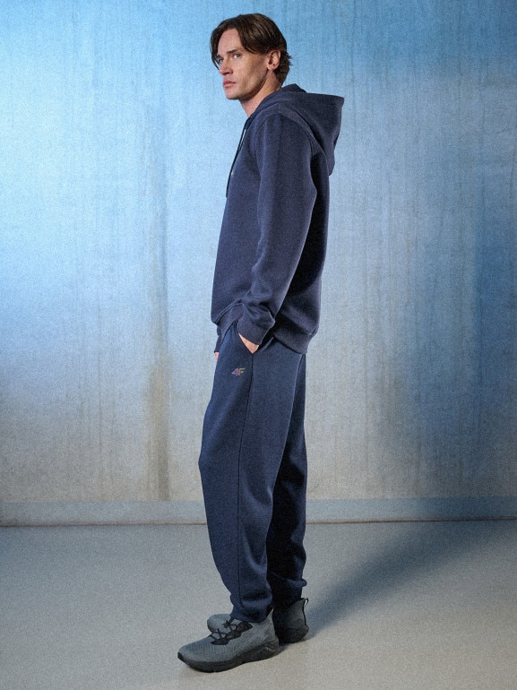 Męskie spodnie dresowe joggery 4F 4FRSS26TTROM1861 - granatowe