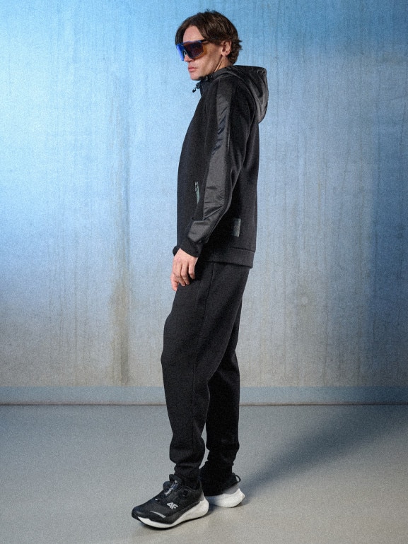 Męskie spodnie dresowe joggery 4F 4FRSS26TTROM1863 - czarne