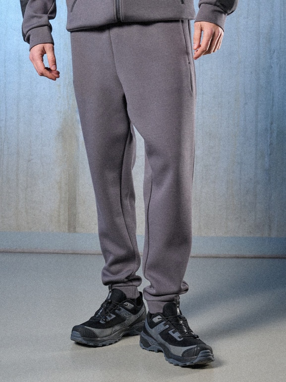Męskie spodnie dresowe joggery 4F 4FRSS26TTROM1863 - szare