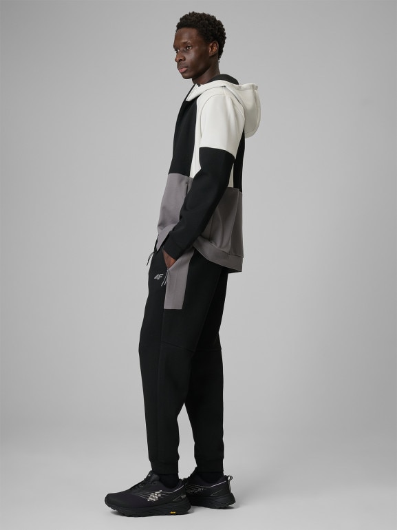 Męskie spodnie dresowe joggery 4F 4FRSS26TTROM1903 - czarne