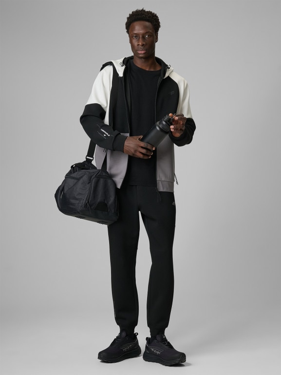 Męskie spodnie dresowe joggery 4F 4FRSS26TTROM1903 - czarne