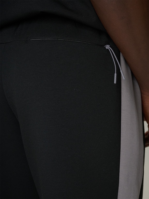 Męskie spodnie dresowe joggery 4F 4FRSS26TTROM1903 - czarne