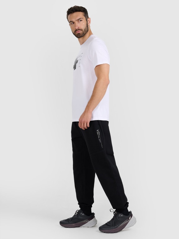 Męskie spodnie dresowe joggery 4F 4FWAW25TTROM1211 - czarne