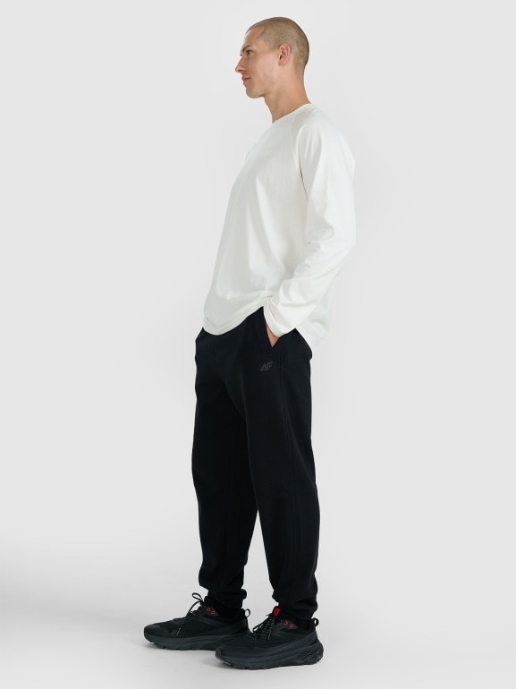 Męskie spodnie dresowe joggery 4F 4FWAW25TTROM1234 - czarne