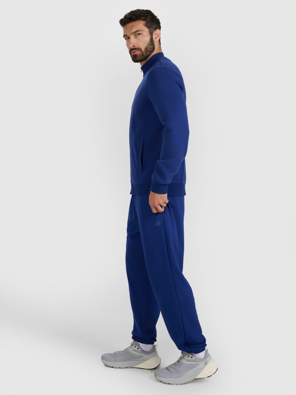 Męskie spodnie dresowe joggery 4F 4FWMM00TTROM1139 - granatowe