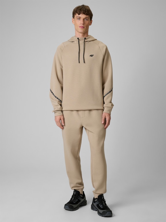 Męskie spodnie dresowe joggery 4F 4FWSS26TTROM1443 - beżowe