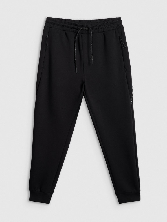 Męskie spodnie dresowe joggery 4F 4FWSS26TTROM1443 - czarne