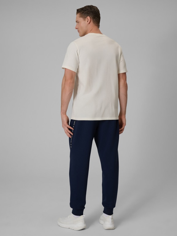 Męskie spodnie dresowe joggery 4F 4FWSS26TTROM1443 - granatowe