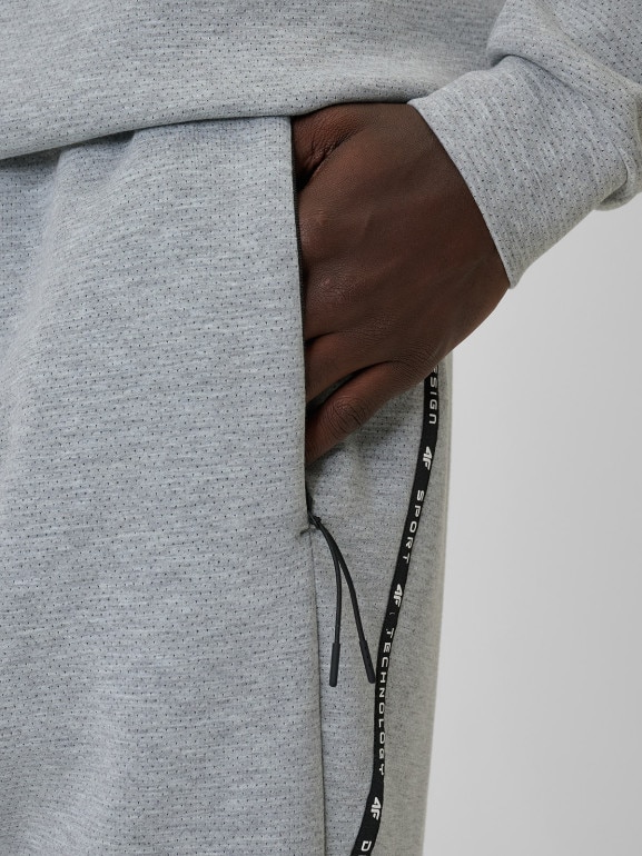 Męskie spodnie dresowe joggery 4F 4FWSS26TTROM1443 - szare