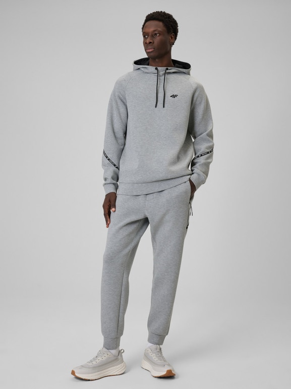 Męskie spodnie dresowe joggery 4F 4FWSS26TTROM1443 - szare