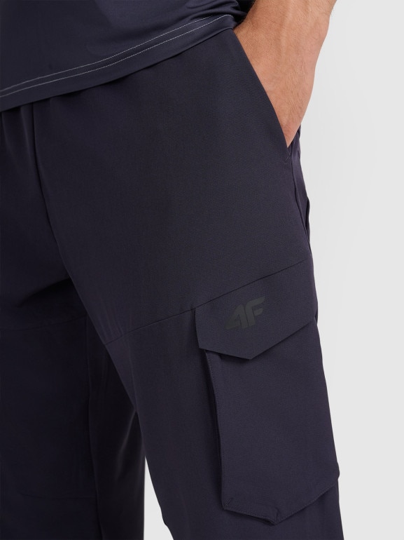 Męskie spodnie treningowe 4F 4FWAW25TFTRM0887 - granatowe