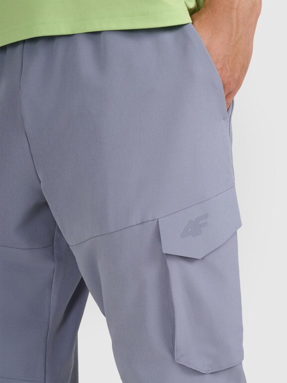 Męskie spodnie treningowe 4F 4FWAW25TFTRM0887 - niebieskie