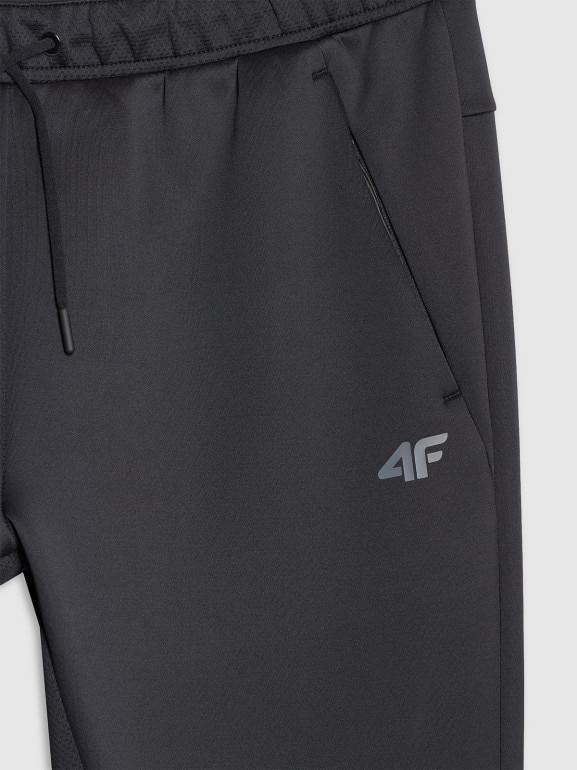 Męskie spodnie treningowe 4F 4FWAW25TFTRM0888 - czarne