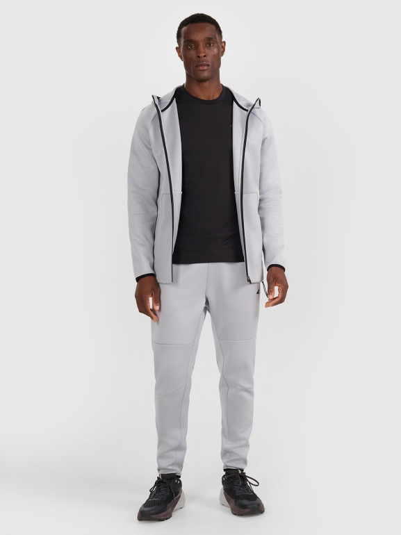 Męskie spodnie treningowe 4F 4FWAW25TFTRM0888 - szare