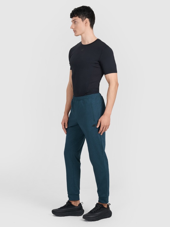 Męskie spodnie treningowe 4F 4FWAW25TFTRM0935 - granatowe