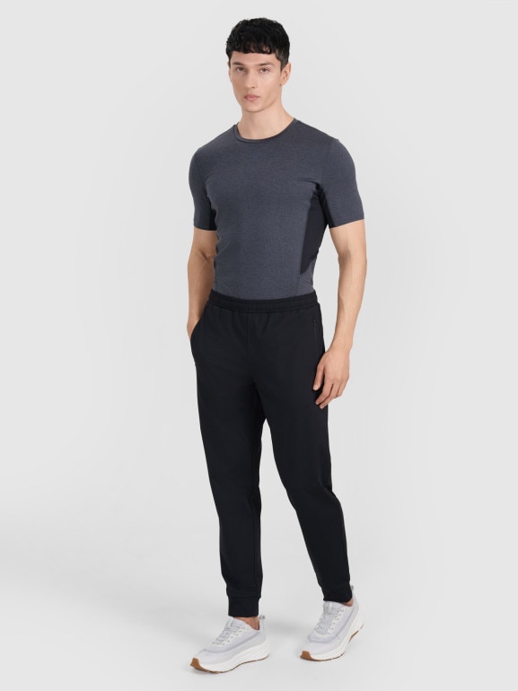 Męskie spodnie treningowe 4F 4FWMM00TFTRM1067 - czarne